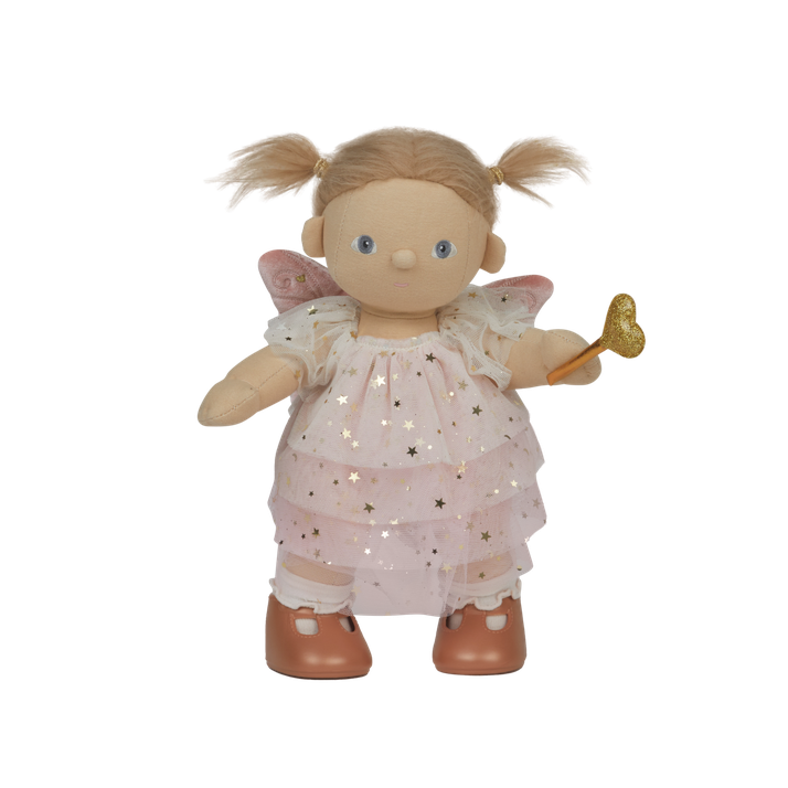 Doll with fairy wings and a star-patterned dress on a white background